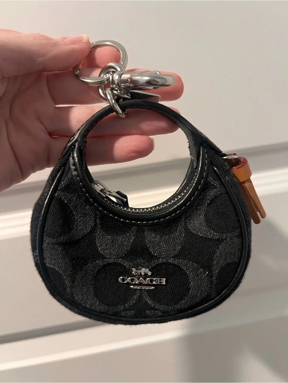 Coach Black Mini Signature Circle Bag Charm with Tan Tassel - Picture 11 of 11